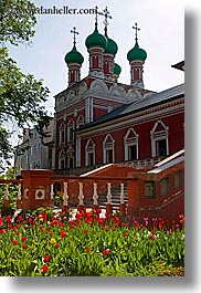 asia, buildings, churches, crosses, domed, flowers, green, monestaries, moscow, nature, onion dome, religious, russia, steeples, structures, tulips, vertical, photograph