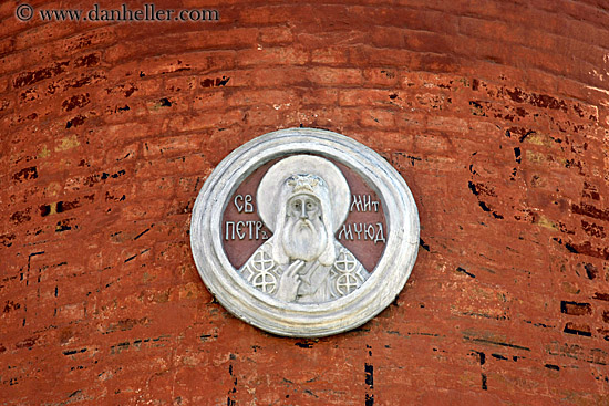 religious-emblem-on-brick-wall.jpg