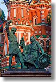 arts, asia, bronze, buildings, churches, colorful, colors, dmitry, kuzma, landmarks, materials, minin, moscow, pokrovskiy, pozharsky, religious, russia, st basil cathedral, st. basil, statues, structures, vertical, photograph