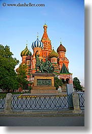 arts, asia, bronze, buildings, churches, colorful, colors, landmarks, materials, moscow, nature, onion dome, pokrovskiy, religious, russia, sky, st basil, st basil cathedral, st. basil, statues, structures, sun, sunsets, vertical, photograph