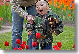 asia, beret, boys, childrens, clothes, colors, flowers, hats, horizontal, moscow, nature, people, red, russia, tulips, photograph
