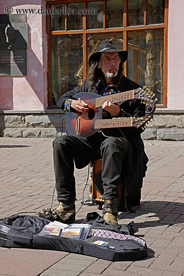 man-playing-double-neck-guitar-1.jpg
