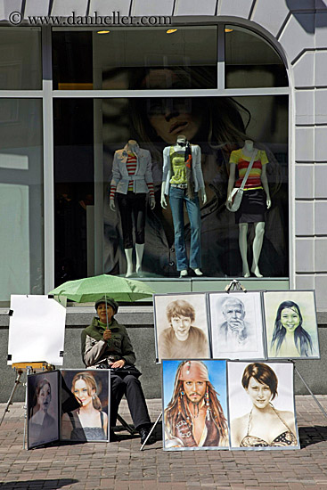 street-artist-n-clothes-store-window.jpg