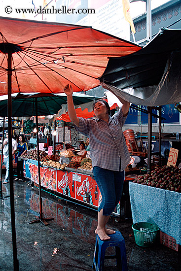 woman-fixing-umbrella.jpg