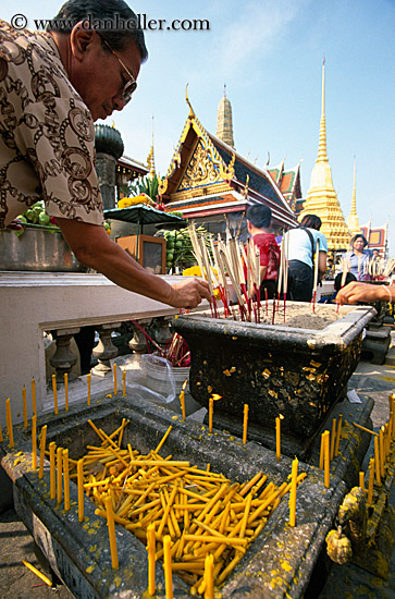 man-lighting-incense.jpg