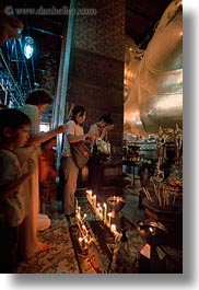 asia, bangkok, candles, people, thailand, vertical, wat phra kaew, photograph