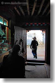 abstracts, arts, asia, doors, doorways, glow, lhasa, lights, silhouettes, tibet, vertical, photograph