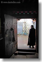 abstracts, arts, asia, doors, doorways, glow, lhasa, lights, silhouettes, tibet, vertical, photograph