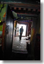 abstracts, arts, asia, doors, doorways, glow, lhasa, lights, silhouettes, tibet, vertical, photograph