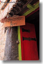 asia, doors, ganden monastery, lhasa, perspective, signs, tibet, tibetan, upview, vertical, photograph