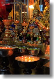 asia, candles, ganden monastery, glow, lhasa, lights, tibet, vertical, photograph