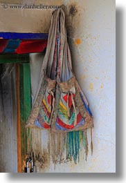 asia, ganden monastery, lhasa, purses, ragged, tibet, vertical, photograph