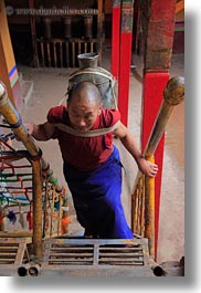asia, ganden monastery, ladder, lhasa, monks, tibet, vertical, photograph