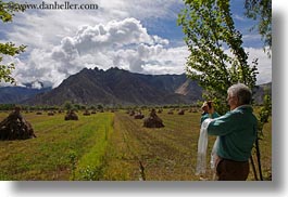 asia, clouds, fields, horizontal, landscapes, lhasa, mountains, nature, photographers, sky, tibet, photograph