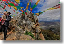asia, babies, flags, horizontal, lhasa, men, monastery hike, prayers, tibet, photograph