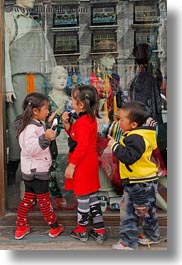 asia, childrens, lhasa, people, stores, tibet, vertical, windows, photograph