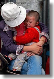 asia, babies, childrens, crying, lhasa, mothers, people, tibet, vertical, photograph