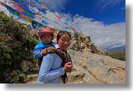 asia, babies, childrens, flags, horizontal, lhasa, people, prayers, tibet, womens, photograph