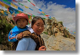 asia, babies, childrens, flags, horizontal, lhasa, people, prayers, tibet, womens, photograph