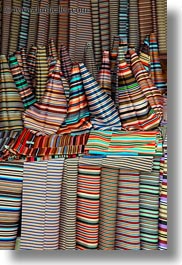 asia, colorful, lhasa, rolls, silk, stores, striped, tibet, vertical, photograph