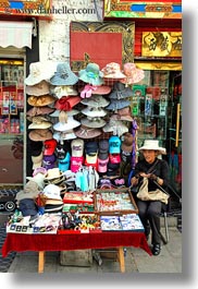 asia, hats, lhasa, stores, tibet, vendors, vertical, womens, photograph