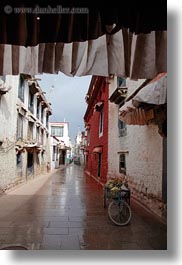 asia, bicycles, lhasa, streets, tibet, vertical, photograph