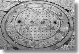 asia, black and white, chinese, covers, horizontal, lhasa, manholes, streets, tibet, photograph