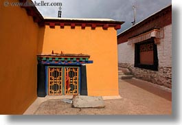 asia, asian, doors, horizontal, oranges, style, tan druk temple, tibet, yellow, photograph