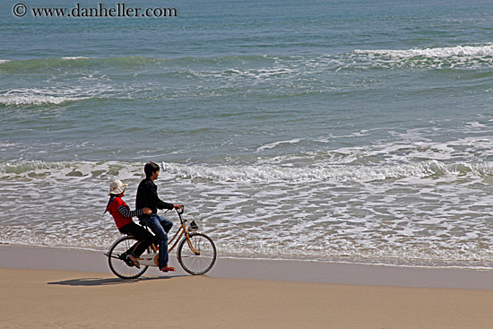 boy-n-girl-on-bicycle-on-beach.jpg