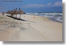 images/Asia/Vietnam/Danang/Beach/conical-straw-beach-umbrellas-3.jpg