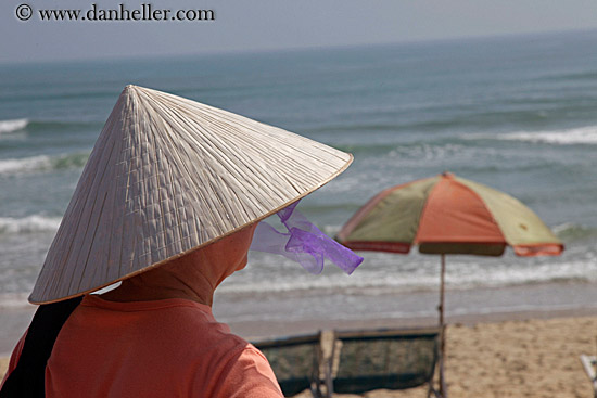 woman-n-conical-hat-at-beach.jpg