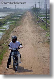 images/Asia/Vietnam/HaLongBay/Bikes/motorcycle-n-wires-3.jpg