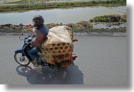 images/Asia/Vietnam/HaLongBay/Bikes/motorcycle-w-chickens-3.jpg