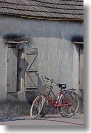 asia, bicycles, bikes, buildings, grey, ha long bay, red, vertical, vietnam, photograph