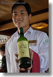 asia, asian, boats, emotions, ha long bay, men, people, serving, smiles, vertical, victory ship, vietnam, white, wines, photograph