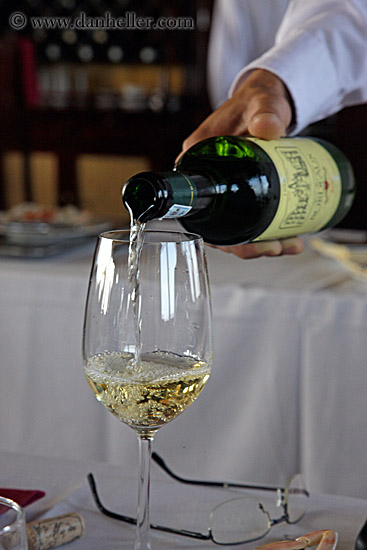 man-serving-white-wine-3.jpg