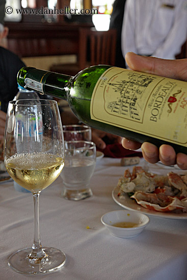 man-serving-white-wine-4.jpg
