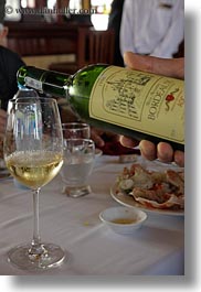 images/Asia/Vietnam/HaLongBay/Boats/VictoryShip/man-serving-white-wine-4.jpg
