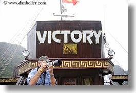 asia, boats, cameras, ha long bay, horizontal, photographers, signs, victory, victory ship, vietnam, photograph