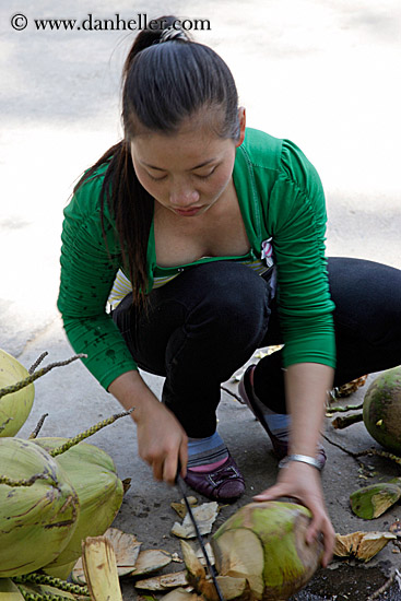 woman-cutting-coconuts.jpg