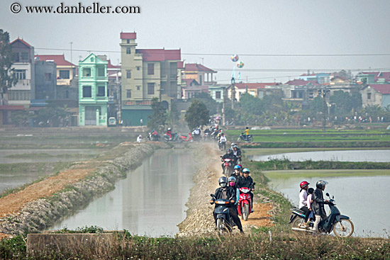 motorcycles-driving-by-water.jpg