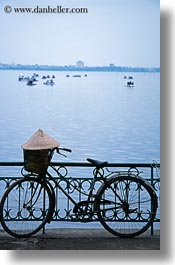 asia, bicycles, bikes, conical, hanoi, hats, vertical, vietnam, photograph