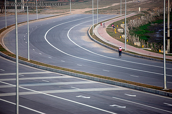 cyclist-on-wide-street.jpg