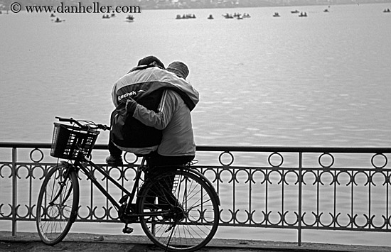 couple-hugging-on-bicycle.jpg