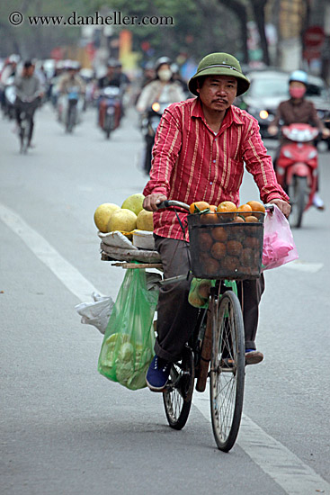 man-riding-bike-w-fruit-1.jpg