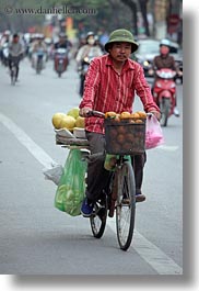 asia, bicycles, bikes, fruits, hanoi, men, people, riding, vertical, vietnam, photograph