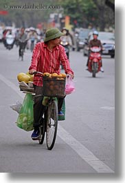 asia, bicycles, bikes, fruits, hanoi, men, people, riding, vertical, vietnam, photograph