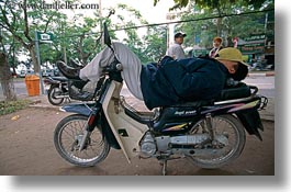 asia, bikes, hanoi, horizontal, men, motorcycles, people, sleeping, vietnam, photograph