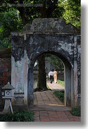 archways, asia, confucian temple literature, couples, hanoi, people, vertical, vietnam, walking, photograph