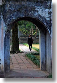 archways, asia, confucian temple literature, hanoi, men, people, vertical, vietnam, walking, photograph
